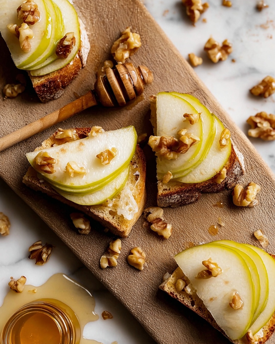 Parmesan Crusted Crostini with Pear, Walnuts & Hot Honey Recipe - Recipe Image