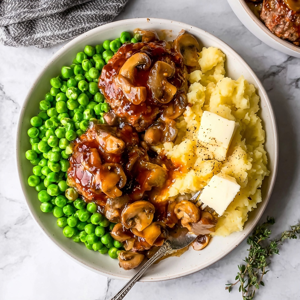 Hearty Hamburger Steak with Mushrooms and Red Wine Gravy Recipe - Recipe Image