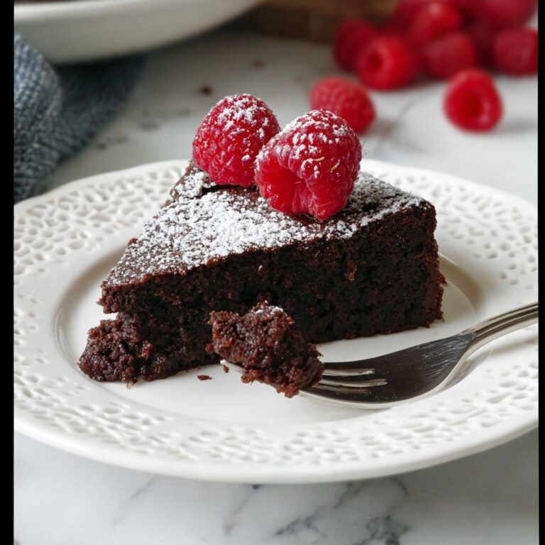 Flourless Chocolate Cake with Raspberries and Powdered Sugar Recipe